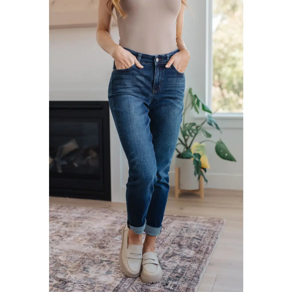 Dark wash Judy Blue slim fit jeans with 4-way stretch mid-rise and optional cuff. Size inclusive from 0–24W