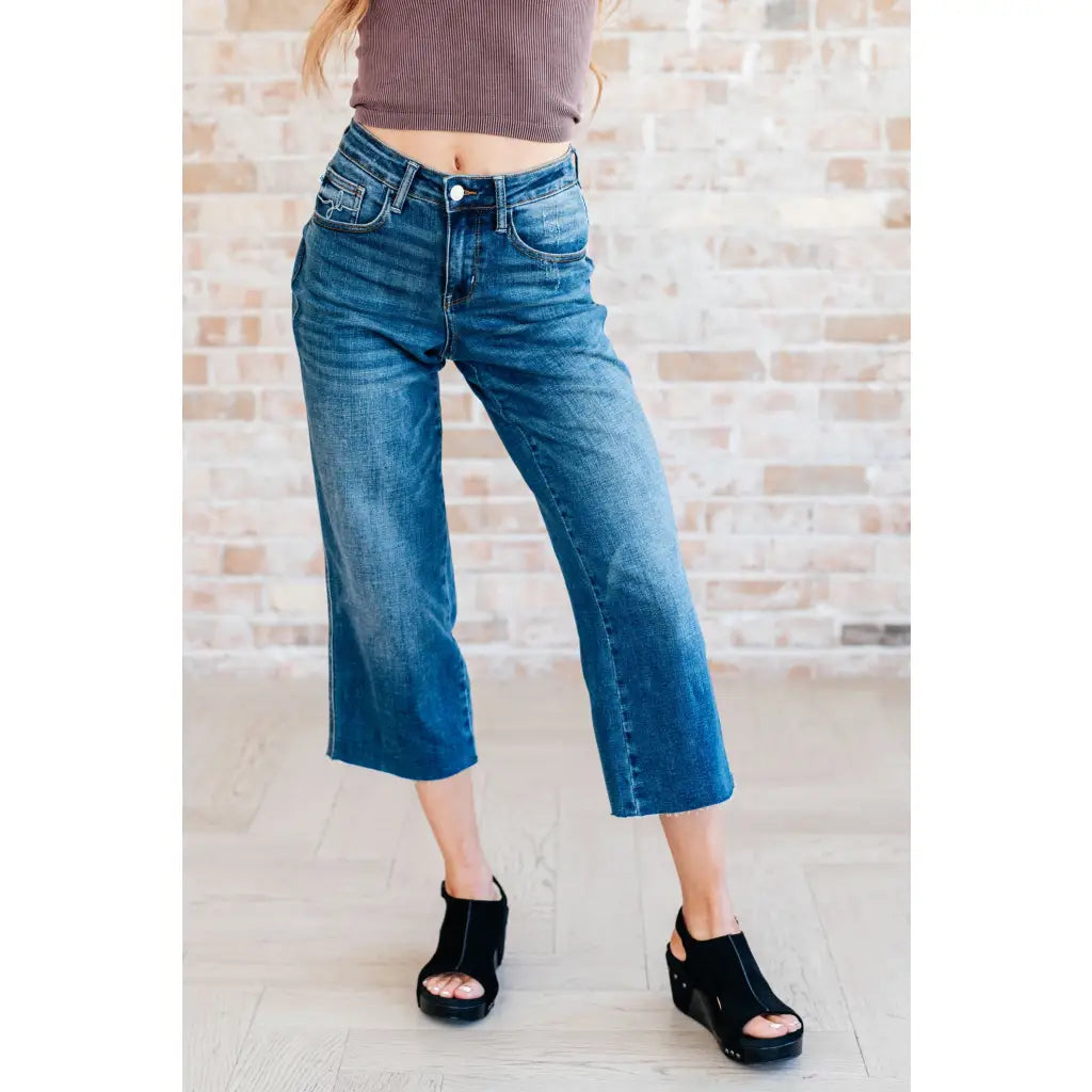 Discover effortless style with our Hayes High Rise Wide Leg Crop Jeans. This medium wash 4-way stretch denim is cut