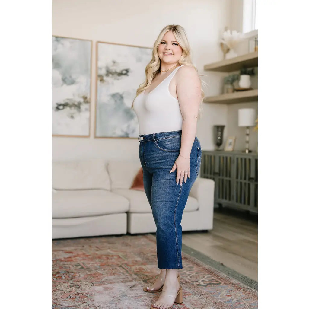 Discover effortless style with our Hayes High Rise Wide Leg Crop Jeans. This medium wash 4-way stretch denim is cut