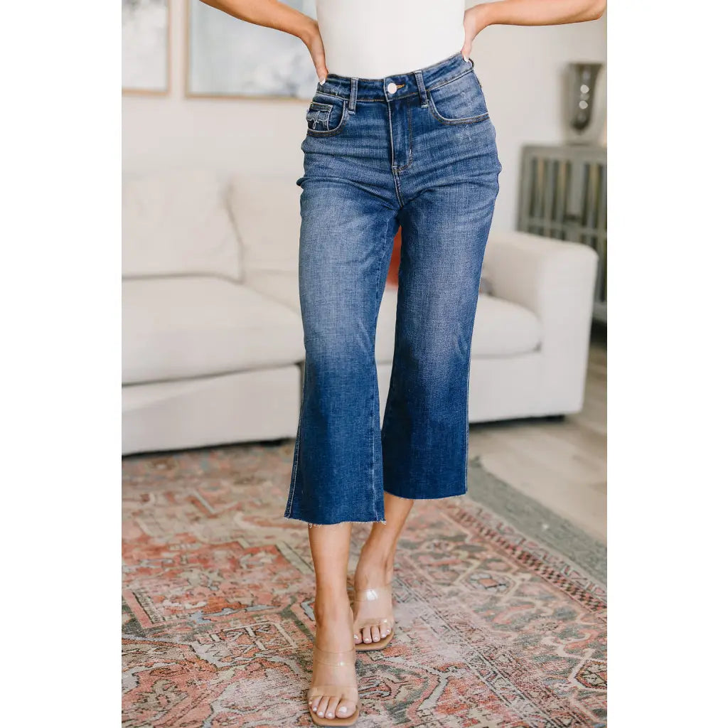 Discover effortless style with our Hayes High Rise Wide Leg Crop Jeans. This medium wash 4-way stretch denim is cut