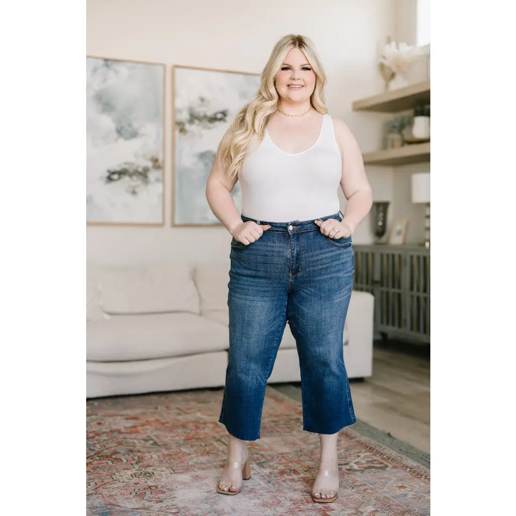 Discover effortless style with our Hayes High Rise Wide Leg Crop Jeans. This medium wash 4-way stretch denim is cut