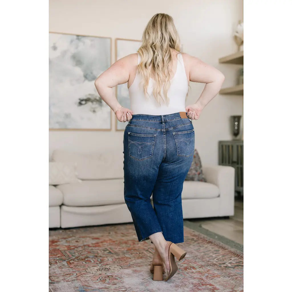 Discover effortless style with our Hayes High Rise Wide Leg Crop Jeans. This medium wash 4-way stretch denim is cut