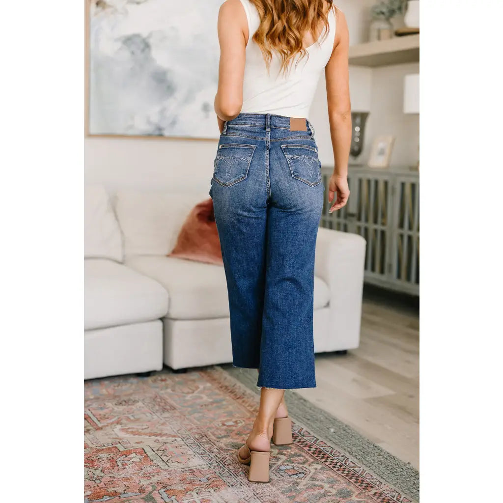 Discover effortless style with our Hayes High Rise Wide Leg Crop Jeans. This medium wash 4 way stretch denim is cut