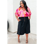 Unleash your inner cosmic queen with our Hazy Cosmic Jive Relaxed Blouse. Made luxurious poly satin this blouse