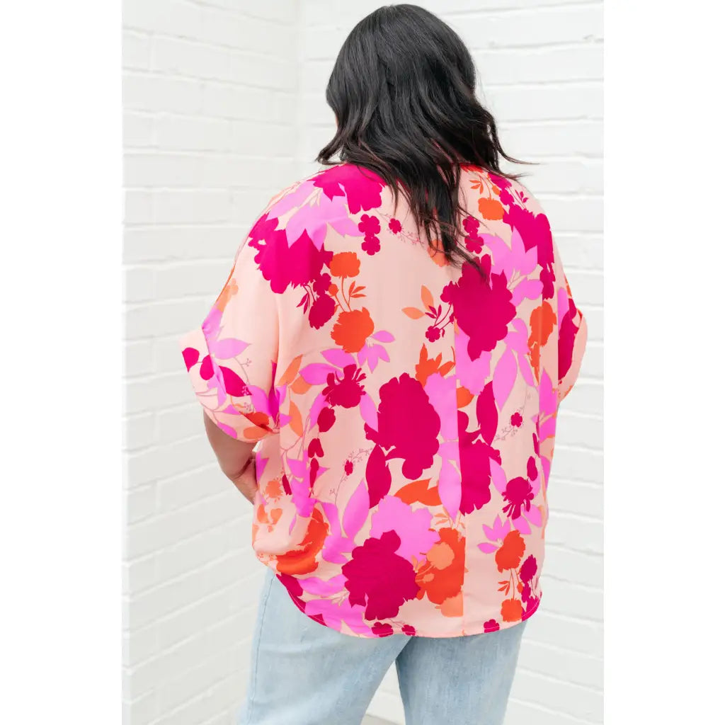 Unleash your inner cosmic queen with our Hazy Cosmic Jive Relaxed Blouse. Made luxurious poly satin this blouse