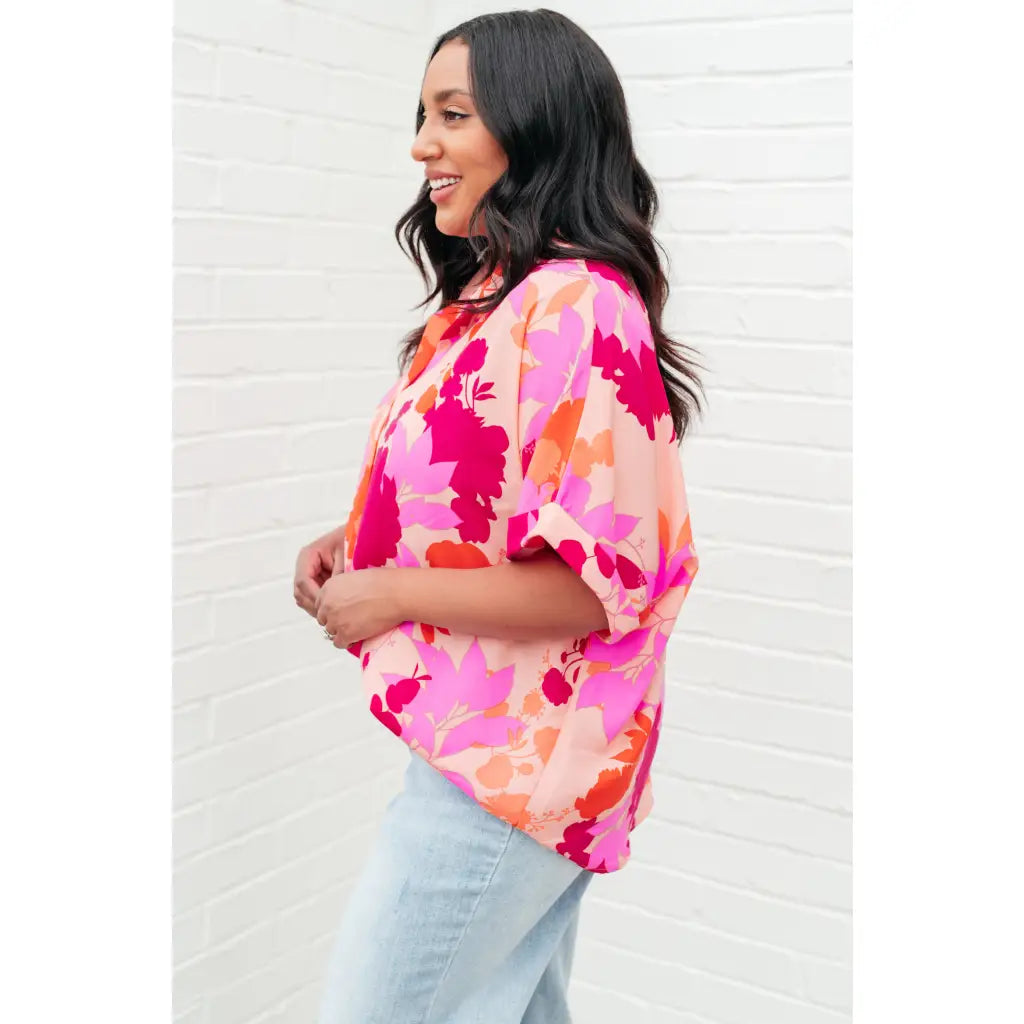 Unleash your inner cosmic queen with our Hazy Cosmic Jive Relaxed Blouse. Made luxurious poly satin this blouse