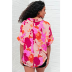 Unleash your inner cosmic queen with our Hazy Cosmic Jive Relaxed Blouse. Made luxurious poly satin this blouse