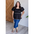 Upgrade your wardrobe with our Her Favorite Records Balloon Sleeve Blouse! Featuring a classic black woven fabric