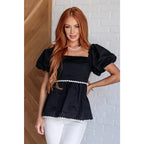 Upgrade your wardrobe with our Her Favorite Records Balloon Sleeve Blouse! Featuring a classic black woven fabric