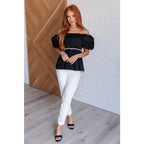 Upgrade your wardrobe with our Her Favorite Records Balloon Sleeve Blouse! Featuring a classic black woven fabric