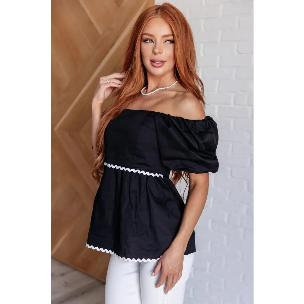 Upgrade your wardrobe with our Her Favorite Records Balloon Sleeve Blouse! Featuring a classic black woven fabric