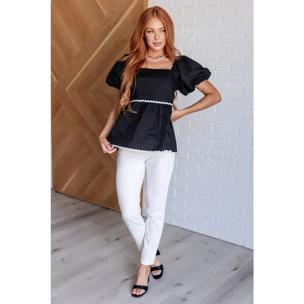 Upgrade your wardrobe with our Her Favorite Records Balloon Sleeve Blouse! Featuring a classic black woven fabric