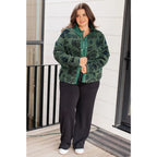 Our High Perspective Geometric Fleece Jacket! Made with green and black soft polar fleece featuring a snap front