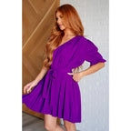 Shop the Hold It Together Pleated Mini Dress available in standard and plus sizes SM-3XL. Bold purple chiffon