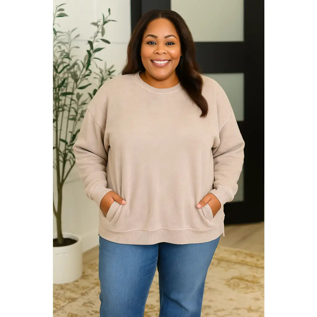 Wrap yourself in cozy vibes with our Iced Mocha Pullover! This plus size friendly stretchy fleece top features drop