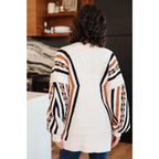 Aztec back panel cardigan with open front and dropped shoulder. Plus size friendly cozy soft knit for effortless
