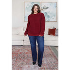 Our In Denial Bubble Pullover Top in Maroon will elevate any wardrobe! Showcase your trendy style with the shoulder