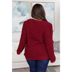 Our In Denial Bubble Pullover Top in Maroon will elevate any wardrobe! Showcase your trendy style with the shoulder