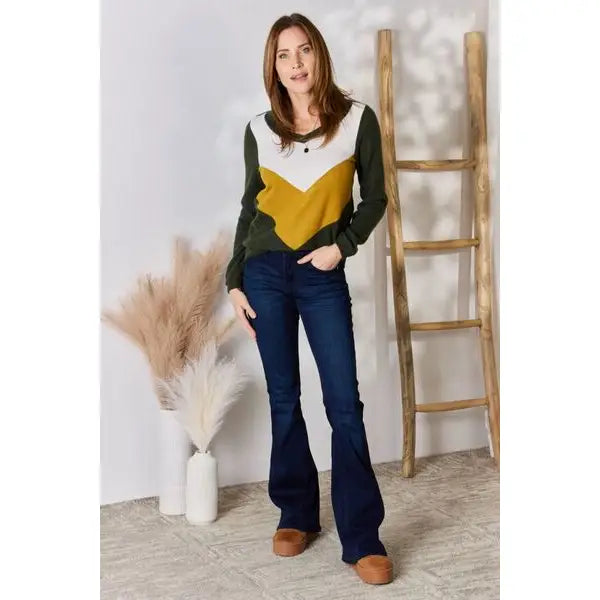 Our Invested Color Block V-Neck Top is stylish and contemporary! Featuring trendy contrasting blocks of color long