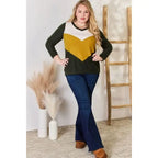 Our Invested Color Block V-Neck Top is stylish and contemporary! Featuring trendy contrasting blocks of color long