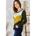Our Invested Color Block V-Neck Top is stylish and contemporary! Featuring trendy contrasting blocks of color long