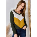 Our Invested Color Block V-Neck Top is stylish and contemporary! Featuring trendy contrasting blocks of color long