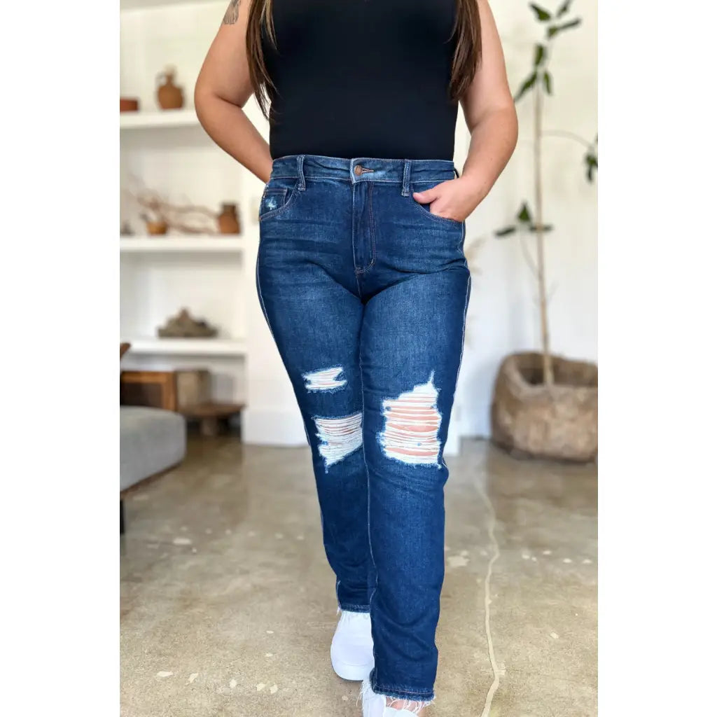 Our It’s Heavy Distressed Rigid Magic Judy Blue Jeans are crafted from durable denim with a hint of magic! These jeans