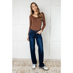 Our Jamie Lynn Mid Rise Judy Blue Jeans will elevate your casual look their dark wash and mostly non-distressed design.