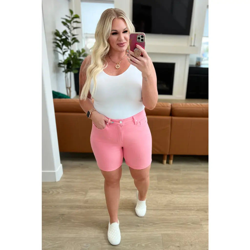 Get ready to rock these Jenna High Rise Control Top Cuffed Shorts in Pink from Judy Blue! Elevate your style