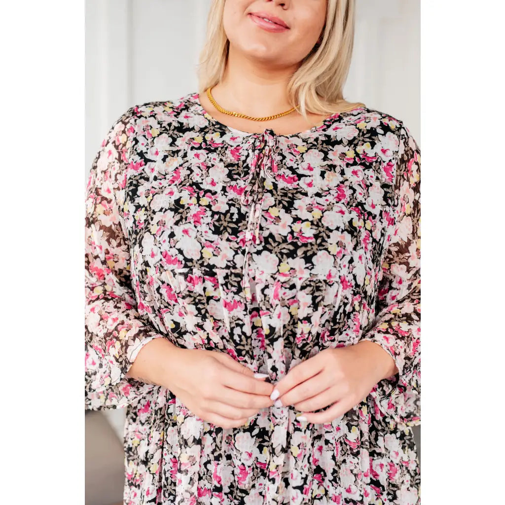 Make a statement in our Jennifer Floral Dress! Boasting combination of luxurious texture and muted floral on black