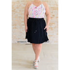 This gorgeous skirt is crafted from a black poly satin with an ultra-luxe feel. knee length high-waisted accordion