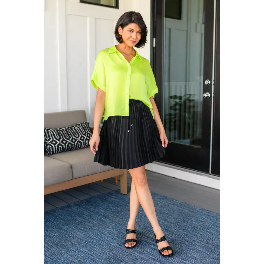 This gorgeous skirt is crafted from a black poly satin with an ultra-luxe feel. knee length high-waisted accordion