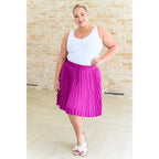 This gorgeous skirt is crafted from a magenta poly satin with an ultra-luxe feel. knee length high-waisted accordion