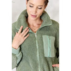 This cozy and chic jacket is a must-have for the colder months featuring soft luxurious sage sherpa fabric