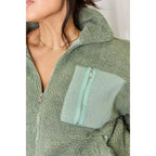 This cozy and chic jacket is a must-have for the colder months featuring soft luxurious sage sherpa fabric
