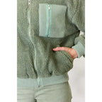 This cozy and chic jacket is a must-have for the colder months featuring soft luxurious sage sherpa fabric