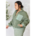 This cozy and chic jacket is a must-have for the colder months featuring soft luxurious sage sherpa fabric