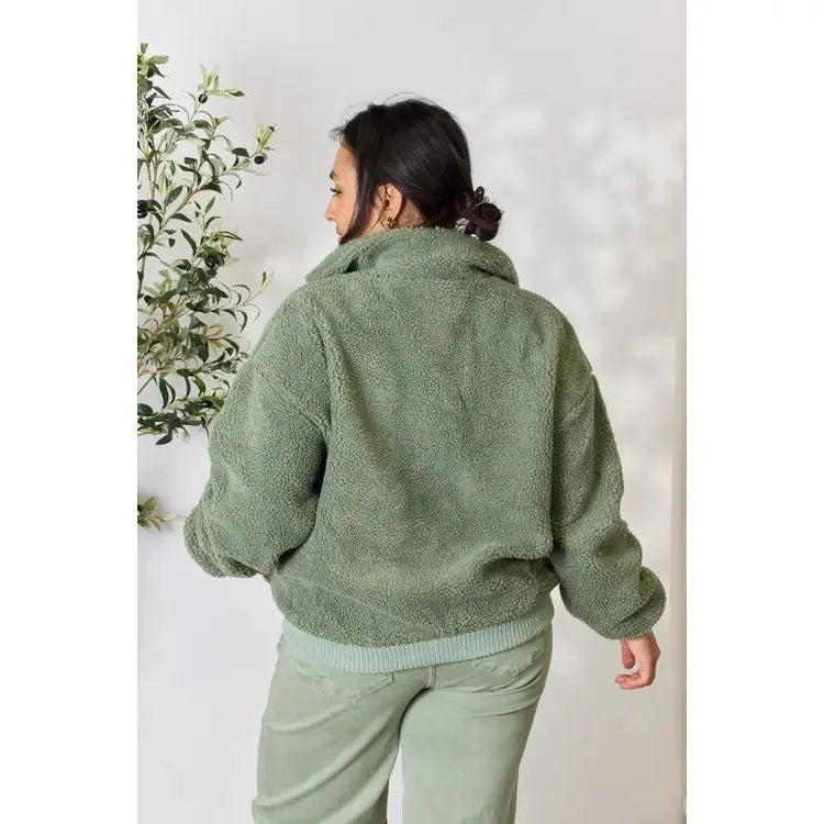 This cozy and chic jacket is a must-have for the colder months featuring soft luxurious sage sherpa fabric