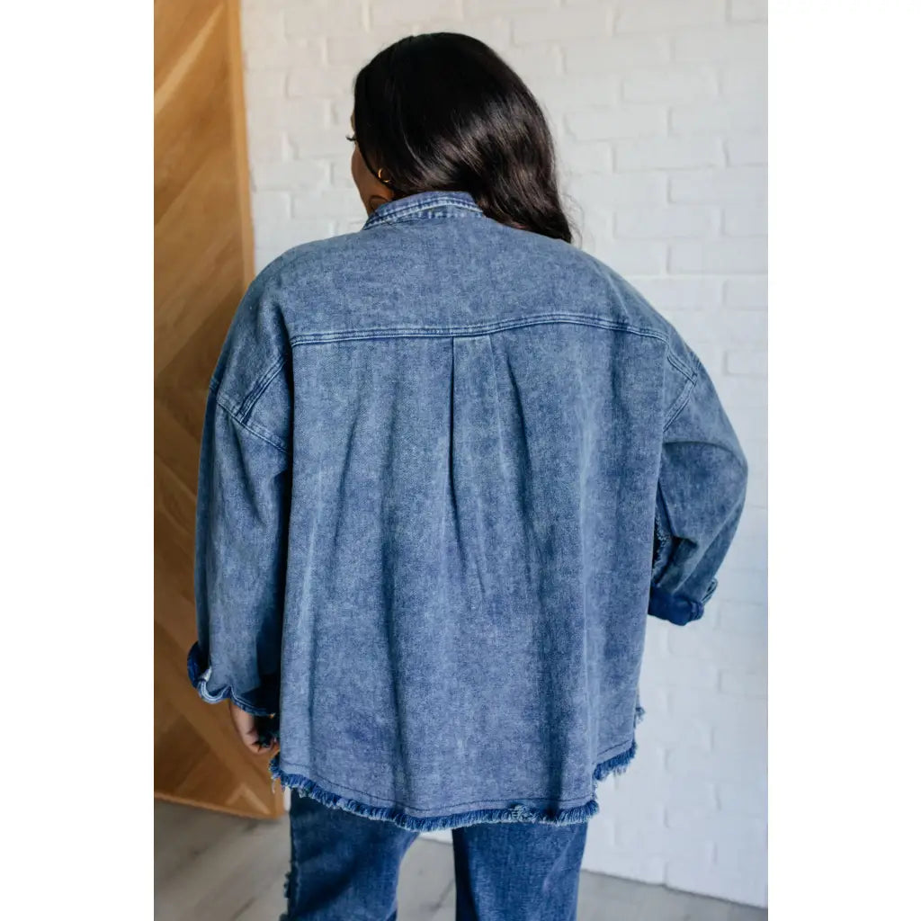 Our Just In Case Mineral Wash Shacket is made from mineral wash denim twill. This shacket features a raw hem and edge