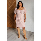 Shop this blush satin plisse mini dress with off shoulder option and flattering fit. Available in plus sizes