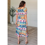 Look at life differently in our Kaleidoscope Print V-Neck Midi Dress. Crafted from luxurious crinkle woven fabric