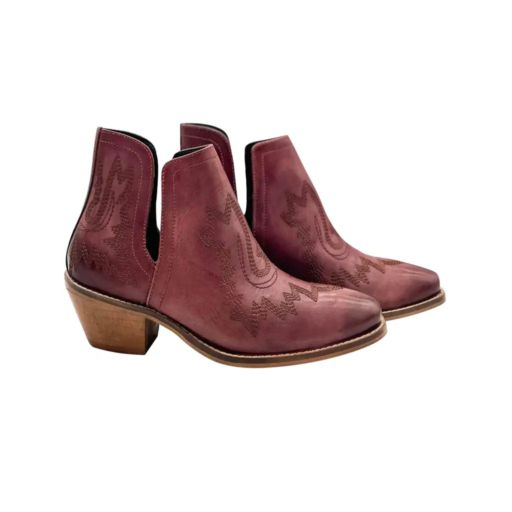 Our Kickin’ Booties in Burgundy are perfection! From the genuine leather construction with intricate western inspired
