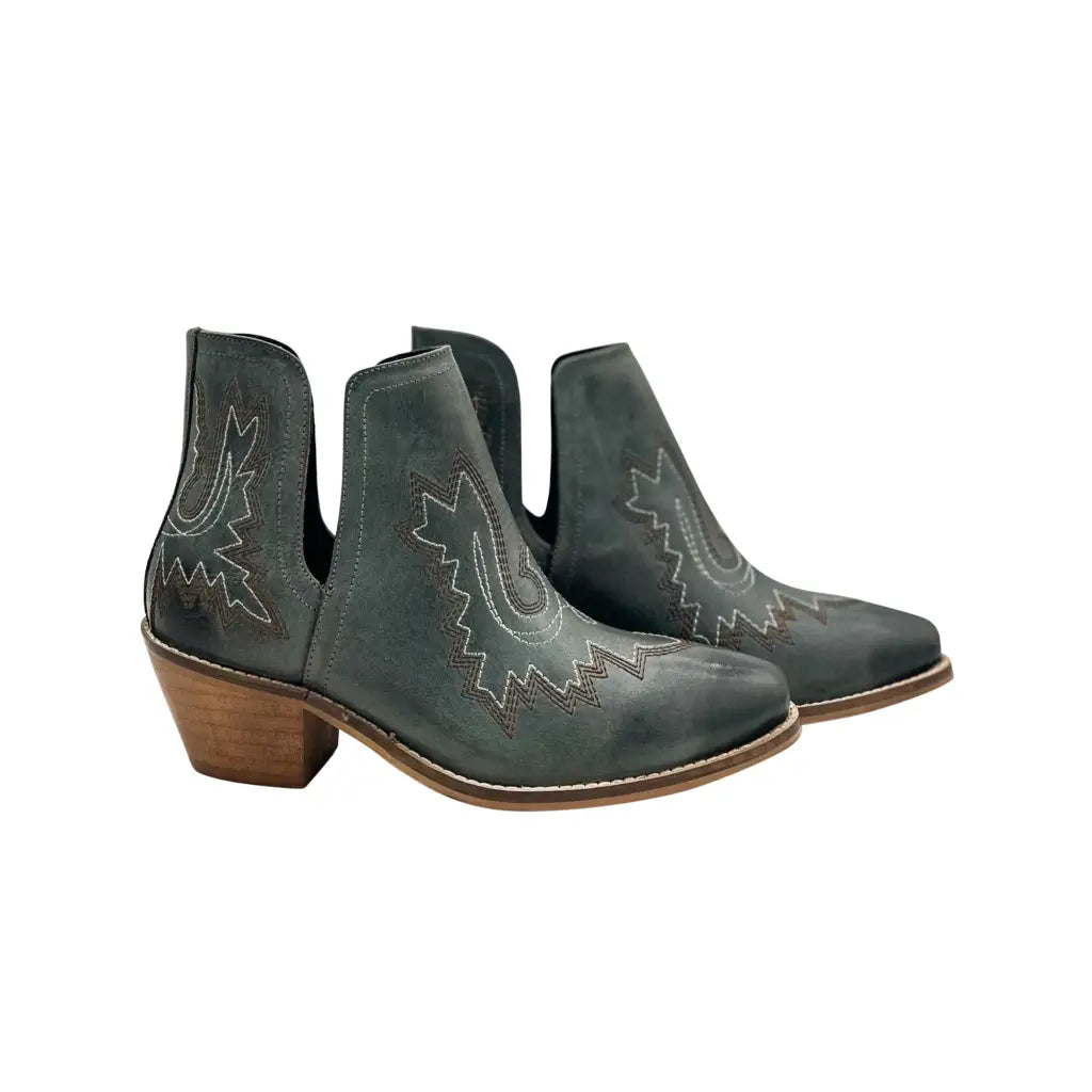 Our Kickin’ Booties in Dark Teal are perfection! From the genuine leather construction with intricate western inspired