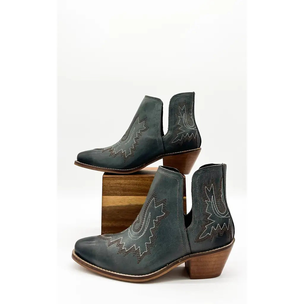 Our Kickin’ Booties in Dark Teal are perfection! From the genuine leather construction with intricate western inspired