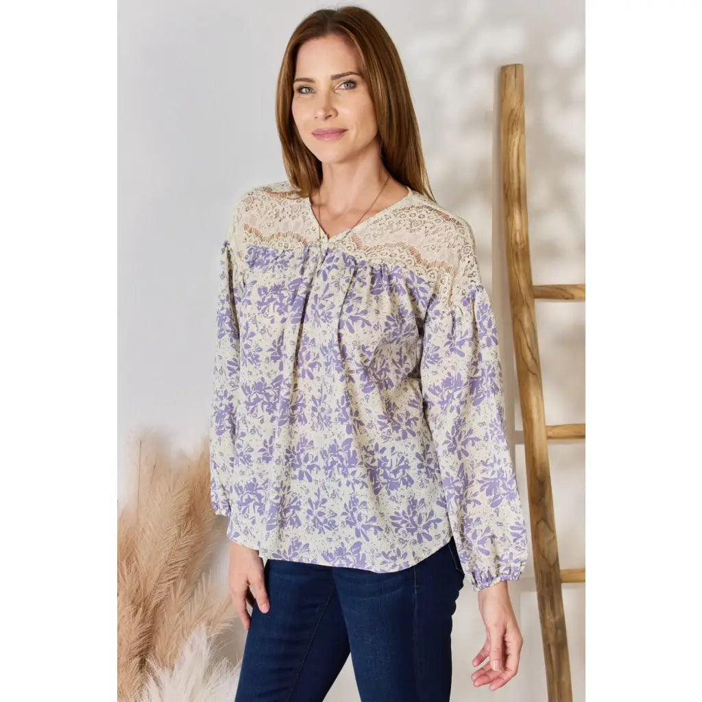 Our Lace in Detail Printed Blouse is a feminine and stylish top that combines the delicate lace accents beautiful lilac