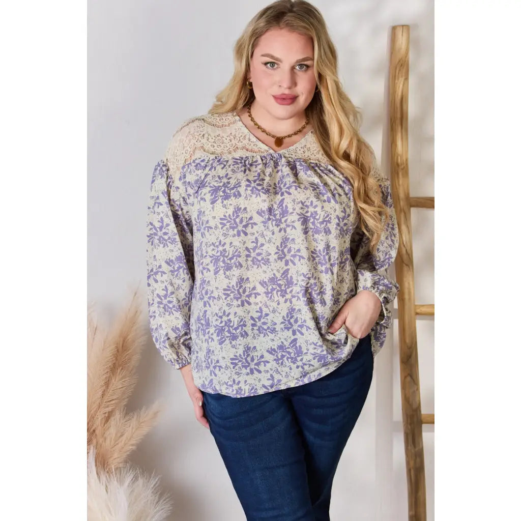 Our Lace in Detail Printed Blouse is a feminine and stylish top that combines the delicate lace accents beautiful lilac