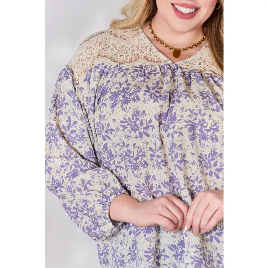 Our Lace in Detail Printed Blouse is a feminine and stylish top that combines the delicate lace accents beautiful lilac