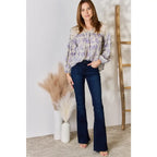 Our Lace in Detail Printed Blouse is a feminine and stylish top that combines the delicate lace accents beautiful lilac