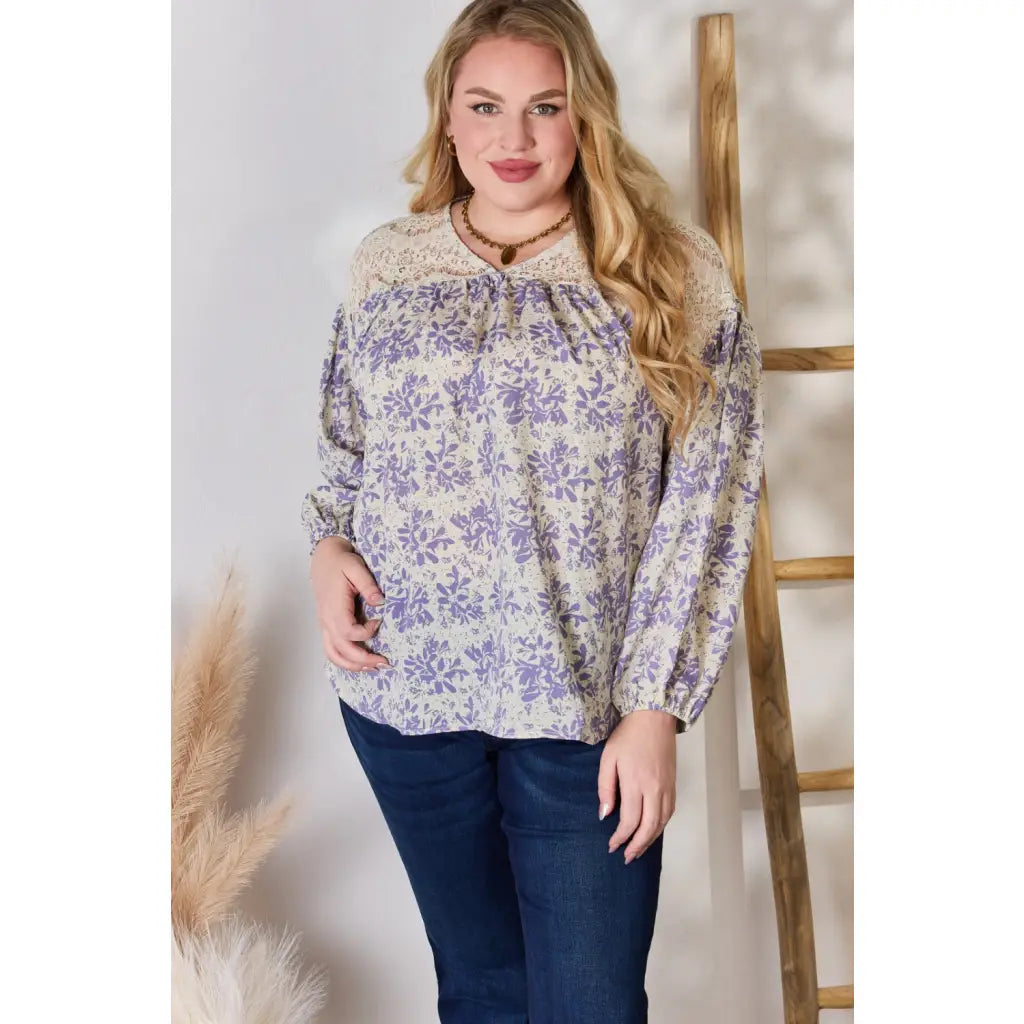 Our Lace in Detail Printed Blouse is a feminine and stylish top that combines the delicate lace accents beautiful lilac
