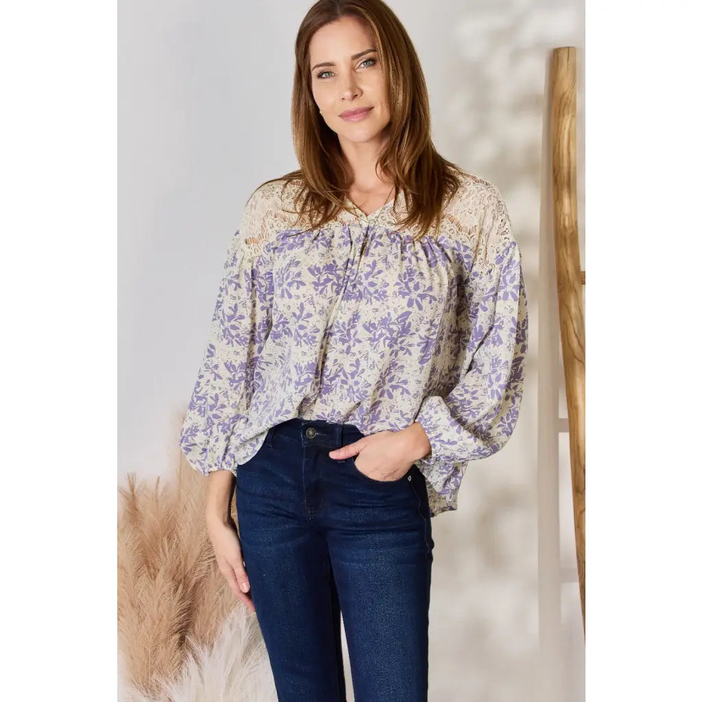 Our Lace in Detail Printed Blouse is a feminine and stylish top that combines the delicate lace accents beautiful lilac